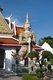Thailand: Guardian figure or Yaksa at the gateway to Wat Arun (Temple of Dawn), Bangkok