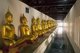 Thailand: A row of Buddhas inside the main viharn at Wat Phra Si Ratana Mahathat, Phitsanulok