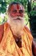 They are known, variously, as sadhus (saints, or 'good ones'), yogis (ascetic practitioners), fakirs (ascetic seeker after the Truth) and sannyasins (wandering mendicants and ascetics). They are the ascetic – and often eccentric – practitioners of an austere form of Hinduism. Sworn to cast off earthly desires, some choose to live as anchorites in the wilderness. Others are of a less retiring disposition, especially in the towns and temples of Nepal's Kathmandu Valley.<br/><br/>

If the Vale of Kathmandu seems to boast more than its share of sadhus and yogis, this is because of the number and importance of Hindu temples in the region. The most important temple of Vishnu in the valley is Changunarayan, and here the visitor will find many Vaishnavite ascetics. Likewise, the most important temple for followers of Shiva is the temple at Pashupatinath.
Vishnu, also known as Narayan, can be identified by his four arms holding a sanka (sea shell), a chakra (round weapon), a gada (stick-like weapon) and a padma (lotus flower). The best-known incarnation of Vishnu is Krishna, and his animal is the mythical Garuda.<br/><br/>

Shiva is often represented by the lingam, or phallus, as a symbol of his creative side. His animal is the bull, Nandi, and his weapon is the trisul, or trident. According to Hindu mythology Shiva is supposed to live in the Himalayas and wears a garland of snakes. He is also said to smoke a lot of bhang, or hashish.